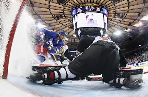 NEW YORK, NEW YORK – APRIL 03: Pavel Buchnevich #89 of the New York Rangers is stopped by Anders Nilsson #31 of the Ottawa Senators during the second period at Madison Square Garden on April 03, 2019 in New York City. (Photo by Bruce Bennett/Getty Images)