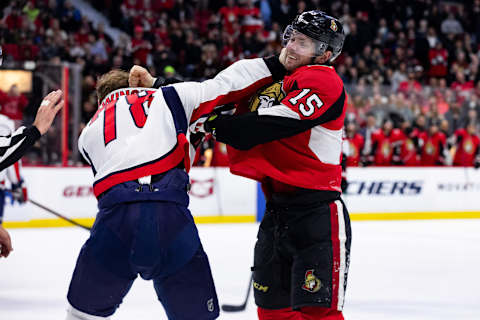 OTTAWA, ON – DECEMBER 29: Washington Capitals Defenceman Tyler Lewington (78) and Ottawa Senators Center Zack Smith (15) fight during second period National Hockey League action between the Washington Capitals and Ottawa Senators on December 29, 2018, at Canadian Tire Centre in Ottawa, ON, Canada. (Photo by Richard A. Whittaker/Icon Sportswire via Getty Images)