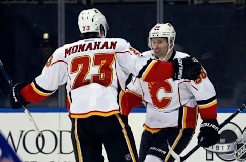 Feb 5, 2017; New York, NY, USA; Calgary Flames right wing Troy Brouwer (36) celebrates scoring a goal with Flames center Sean Monahan (23) during the third period against the New York Rangers at Madison Square Garden. Mandatory Credit: Adam Hunger-USA TODAY Sports