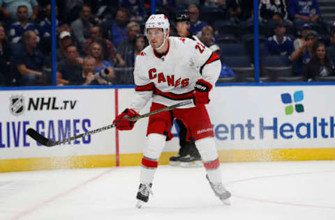 TAMPA, FL – SEPTEMBER 17: Carolina Hurricanes defenseman Brett Pesce (22) skates during the NHL Preseason game between the Carolina Hurricanes and Tampa Bay Lightning on September 17, 2019 at Amalie Arena in Tampa, FL. (Photo by Mark LoMoglio/Icon Sportswire via Getty Images)