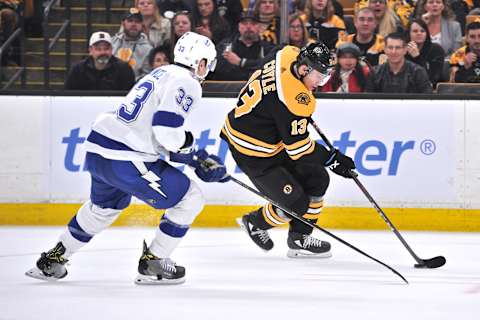 BOSTON, MA – APRIL 06: Boston Bruins Center Charlie Coyle (13) tries to get past Tampa Bay Lightning Defenceman Cameron Gaunce (33). During the Boston Bruins game against the Tampa Bay Lightning on April 06, 2019 at TD Garden in Boston, MA. (Photo by Michael Tureski/Icon Sportswire via Getty Images)