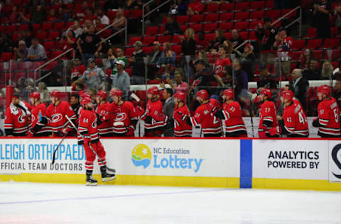 RALEIGH, NC – SEPTEMBER 18: Carolina Hurricanes center Clark Bishop (64) celebrates a goal during the 3rd period of the Carolina Hurricanes game versus the Tampa Bay Lightning on September 18th, 2019 at PNC Arena in Raleigh, NC. (Photo by Jaylynn Nash/Icon Sportswire via Getty Images)