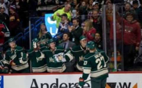 Apr 9, 2016; Saint Paul, MN, USA; Minnesota Wild forward Zac Dalpe (27) celebrates his first goal as a member of the Minnesota Wild in the second period against the Calgary Flames at Xcel Energy Center. Mandatory Credit: Brad Rempel-USA TODAY Sports