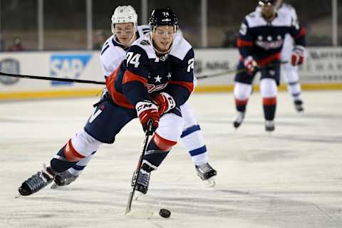 ANNAPOLIS, MD – MARCH 03: Washington Capitals defenseman John Carlson (74) skates Toronto Maple Leafs center Zach Hyman (11) on March 3, 2018, at the Navy – Marine Corps Memorial Stadium in Annapolis, MD. The Washington Capitals defeated the Toronto Maple Leafs, 5-2. (Photo by Mark Goldman/Icon Sportswire via Getty Images)