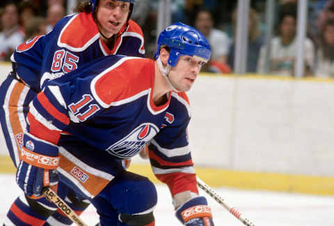 Future New York Rangers captain Mark Messier #11 skates for the Edmonton Oilers (Photo by Focus on Sport/Getty Images)