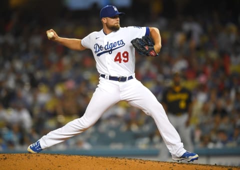 Aug 17, 2021; Los Angeles, California, USA; Los Angeles Dodgers relief pitcher Blake Treinen (49) in the eighth inning of the game against the Pittsburgh Pirates at Dodger Stadium. Mandatory Credit: Jayne Kamin-Oncea-USA TODAY Sports