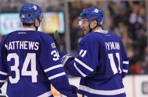 NHL Power Rankings: Toronto Maple Leafs forward Zach Hyman (11) talks to forward Auston Matthews (34) during a break in the action against the Ottawa Senators at the Air Canada Centre. Ottawa defeated Toronto 3-2 in an overtime shoot out. Mandatory Credit: John E. Sokolowski-USA TODAY Sports