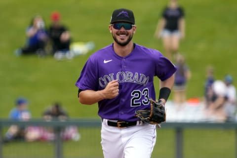 Mar 29, 2022; Salt River Pima-Maricopa, Arizona, USA; Colorado Rockies left fielder Kris Bryant (23) runs to the dugout against the Los Angeles Angels during a spring training game at Salt River Fields at Talking Stick. Mandatory Credit: Rick Scuteri-USA TODAY Sports