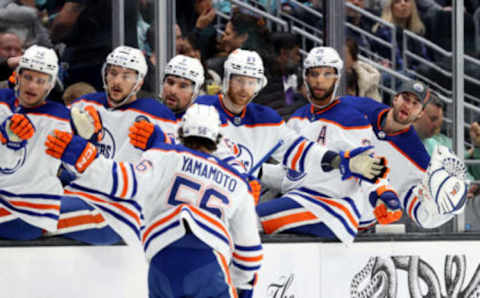 SEATTLE, WASHINGTON – MARCH 18: Kailer Yamamoto #56 of the Edmonton Oilers celebrates his goal against the Seattle Kraken during the first period at Climate Pledge Arena on March 18, 2023 in Seattle, Washington. (Photo by Steph Chambers/Getty Images)