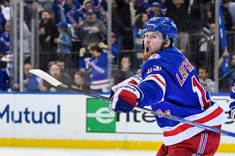 New York Rangers left wing Alexis Lafrenire (13) celebrates his goal against the Pittsburgh Penguins during the second period in game five of the first round Mandatory Credit: Dennis Schneidler-USA TODAY Sports