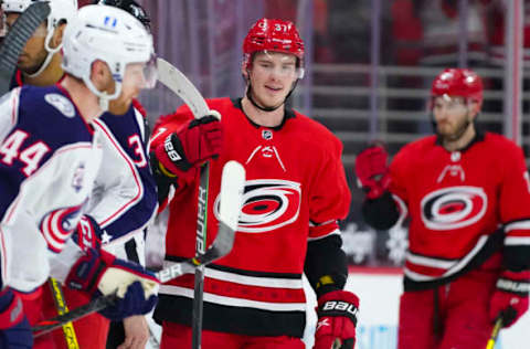 Mar 20, 2021; Raleigh, North Carolina, USA; Carolina Hurricanes right wing Andrei Svechnikov (37) celebrates his second period goal against the Columbus Blue Jackets at PNC Arena. Mandatory Credit: James Guillory-USA TODAY Sports