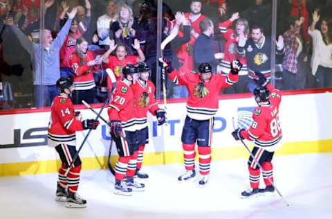 NHL Power Rankings: Chicago Blackhawks right wing Marian Hossa (81) celebrates with teammates after scoring the game-winning goal against the New Jersey Devils in overtime at United Center. Mandatory Credit: Jerry Lai-USA TODAY Sports