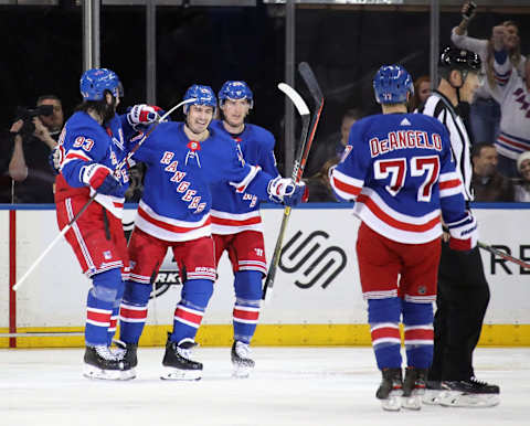 NEW YORK, NEW YORK – JANUARY 31: (L-R) Mika Zibanejad #93, Chris Kreider #20, Ryan Strome #16 and Tony DeAngelo #77 of the New York Rangers celebrate Zibanejad’s third period goal against the Detroit Red Wings at Madison Square Garden on January 31, 2020 in New York City. The Rangers defeated the Red Wings 4-2.(Photo by Bruce Bennett/Getty Images)