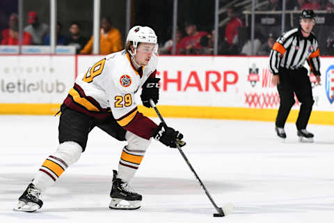 CHARLOTTE, NC – JUNE 01: Chicago Wolves center Cody Glass (29) brings the puck up the ice during game one of the Calder Cup finals between the Chicago Wolves and the Charlotte Checkers on June 01, 2019 at Bojangles Coliseum in Charlotte,NC.(Photo by Dannie Walls/Icon Sportswire via Getty Images)