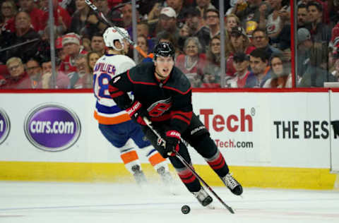 RALEIGH, NC – MAY 03: Haydn Fleury #4 of the Carolina Hurricanes carries the puck in Game Four of the Eastern Conference Second Round against the New York Islanders during the 2019 NHL Stanley Cup Playoffs on May 3, 2019 at PNC Arena in Raleigh, North Carolina. (Photo by Gregg Forwerck/NHLI via Getty Images)