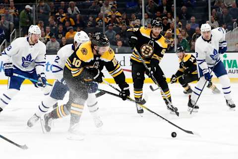 BOSTON, MA – OCTOBER 22: Boston Bruins right wing Anders Bjork (10) picks up a loose puck during a game between the Boston Bruins and the Toronto Maple Leafs on October 22, 2019, at TD Garden in Boston, Massachusetts. (Photo by Fred Kfoury III/Icon Sportswire via Getty Images)