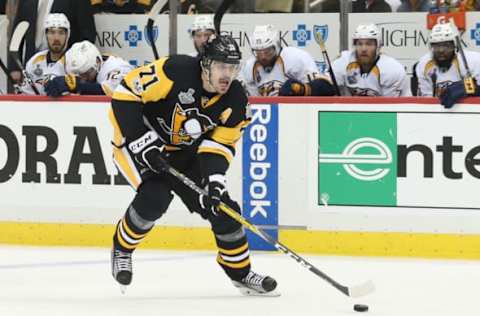 May 31, 2017; Pittsburgh, PA, USA; Pittsburgh Penguins center Evgeni Malkin (71) skates with the puck and scores a goal against the Nashville Predators during the third period in game two of the 2017 Stanley Cup Final at PPG PAINTS Arena. Mandatory Credit: Charles LeClaire-USA TODAY Sports