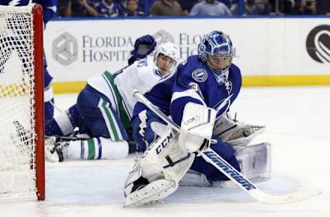 NHL Trade Rumors: Tampa Bay Lightning goalie Ben Bishop (30) makes a save against the Vancouver Canucks during the second period at Amalie Arena. Mandatory Credit: Kim Klement-USA TODAY Sports