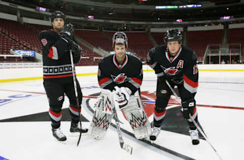 RALEIGH, NC – SEPTEMBER 10: Tim Gleason, Cam Ward and Eric Staal of the Carolina Hurricanes unveil their alternate uniforms for the 2008-2009 NHL season today at the RBC Center in Raleigh, North Carolina on September 10, 2008. (Photo by Gregg Forwerck/NHLI via Getty Images)