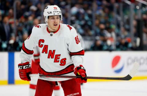 SEATTLE, WASHINGTON – NOVEMBER 24: Teuvo Teravainen #86 of the Carolina Hurricanes looks on against the Seattle Kraken during the third period at Climate Pledge Arena on November 24, 2021, in Seattle, Washington. (Photo by Steph Chambers/Getty Images)