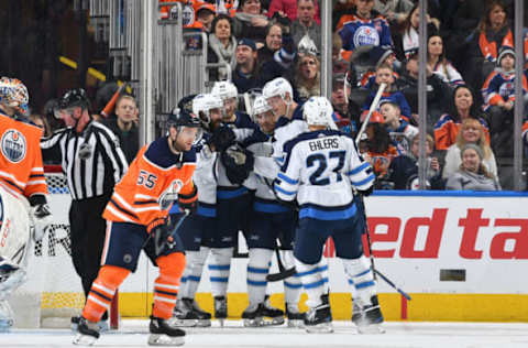 EDMONTON, AB – DECEMBER 31: Joel Armia #40, Bryan Little #18, Mathieu Perreault #85, Tyler Myers #57 and Nikolaj Ehlers #27 of the Winnipeg Jets celebrate after a goal during the game against the Edmonton Oilers on December 31, 2017 at Rogers Place in Edmonton, Alberta, Canada. (Photo by Andy Devlin/NHLI via Getty Images)