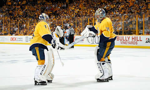 NASHVILLE, TN – MAY 10: Juuse Saros #74 replaces Pekka Rinne #35 of the Nashville Predators in net during the first period of Game Seven of the Western Conference Second Round against the Winnipeg Jets during the 2018 NHL Stanley Cup Playoffs at Bridgestone Arena on May 10, 2018 in Nashville, Tennessee. (Photo by John Russell/NHLI via Getty Images)