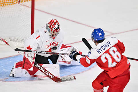 HALIFAX, CANADA – JANUARY 05: Goaltender Thomas Milic #1 of Team Canada makes a save on a shot by Martin Rysavy #26 of Team Czech Republic during the first period in the gold medal round of the 2023 IIHF World Junior Championship at Scotiabank Centre on January 5, 2023 in Halifax, Nova Scotia, Canada. (Photo by Minas Panagiotakis/Getty Images)