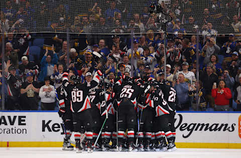 Apr 13, 2023; Buffalo, New York, USA; The Buffalo Sabres celebrate a win over the Ottawa Senators at KeyBank Center. Mandatory Credit: Timothy T. Ludwig-USA TODAY Sports