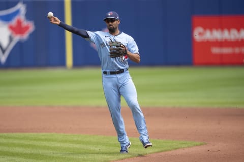 Jul 18, 2021; Buffalo, New York, CAN; Toronto Blue Jays second baseman Marcus Semien (10) throws out Texas Rangers second baseman Nick Solak (15) (not pictured) after fielding a ground ball during the fifth inning at Sahlen Field. Mandatory Credit: Gregory Fisher-USA TODAY Sports