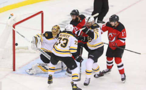 Jan 14, 2021; Newark, New Jersey, USA; New Jersey Devils defenseman Ty Smith (24) (not shown) scores his first NHL goal during the third period of their game against the Boston Bruins at Prudential Center. Mandatory Credit: Ed Mulholland-USA TODAY Sports