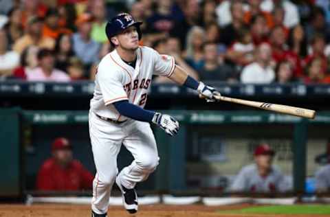 Aug 16, 2016; Houston, TX, USA; Houston Astros third baseman Alex Bregman (2) hits a two run home run during the first inning against the St. Louis Cardinals at Minute Maid Park. Mandatory Credit: Troy Taormina-USA TODAY Sports