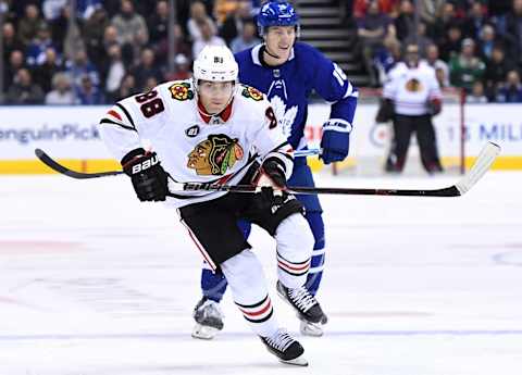 Mar 13, 2019; Toronto, Ontario, CAN; Chicago Blackhawks forward Patrick Kane (88) pursues the puck against Toronto Maple Leafs in the first period at Scotiabank Arena. Mandatory Credit: Dan Hamilton-USA TODAY Sports