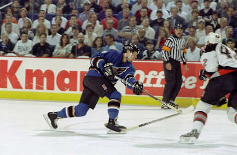 28 May 1998: Phil Housley #96 of the Washington Capitals in action during an Eastern Conference Finals Game 3 against the Buffalo Sabres at the Marine Midland Arena in Buffalo, New York. The Capitals defeated the Sabres 4-3 in overtime. Mandatory Credit: