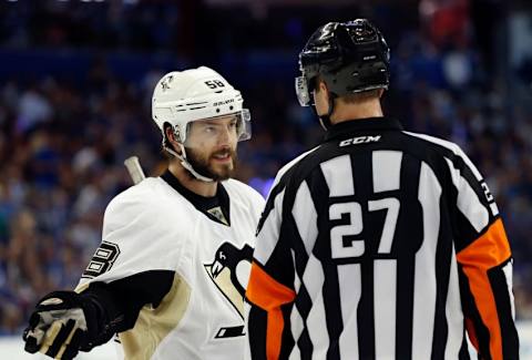 May 18, 2016; Tampa, FL, USA; Pittsburgh Penguins defenseman Kris Letang (58) talks with the referee during the second period of game three of the Eastern Conference Final of the 2016 Stanley Cup Playoffs at Amalie Arena. Mandatory Credit: Kim Klement-USA TODAY Sports