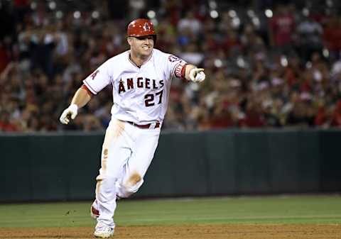 Jun 27, 2016; Anaheim, CA, USA; Los Angeles Angels center fielder Mike Trout (27) reacts after tripping while rounding second base during the sixth inning against the Houston Astros at Angel Stadium of Anaheim. Mandatory Credit: Richard Mackson-USA TODAY Sports