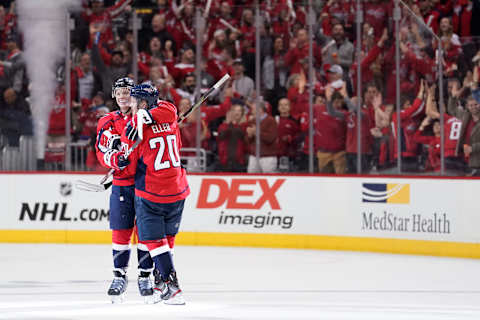 WASHINGTON, DC – APRIL 11: Lars Eller #20 of the Washington Capitals celebrates with John Carlson #74 after scoring an empty net goal in the third period against the Carolina Hurricanes in Game One of the Eastern Conference First Round during the 2019 NHL Stanley Cup Playoffs at Capital One Arena on April 11, 2019 in Washington, DC. (Photo by Patrick McDermott/NHLI via Getty Images)