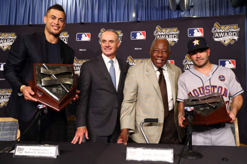 LOS ANGELES, CA – OCTOBER 25: Giancarlo Stanton #27 of the Miami Marlins, Major League Baseball Commissioner Robert D. Manfred Jr., Hall of Famer Hank Aaron and Jose Altuve #27 of the Houston Astros talk to the media during the Hank Aaron Award press conference prior to Game 2 of the 2017 World Series between the Houston Astros and the Los Angeles Dodgers at Dodger Stadium on Wednesday, October 25, 2017 in Los Angeles, California. (Photo by Alex Trautwig/MLB Photos via Getty Images)