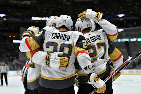 DALLAS, TX – NOVEMBER 25: William Carrier #28, Shea Theodore #27 and the Vegas Golden Knights celebrate a goal against the Dallas Stars at the American Airlines Center on November 25, 2019 in Dallas, Texas. (Photo by Glenn James/NHLI via Getty Images)