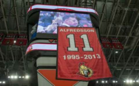 Dec 29, 2016; Ottawa, Ontario, CAN; Daniel Alfredsson (11) jersey and number are retired prior to the start of game between the Detroit Red Wings and Ottawa Senators at the Canadian Tire Centre. Mandatory Credit: Marc DesRosiers-USA TODAY Sports