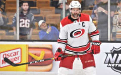 BOSTON, MA – MAY 09: Carolina Hurricanes right wing Justin Williams (14) passes the puck back and forth with a teammate in warm ups. During Game 1 of the Eastern Conference Finals featuring the Carolina Hurricanes against the Boston Bruins on May 09, 2019 at TD Garden in Boston, MA. (Photo by Michael Tureski/Icon Sportswire via Getty Images)