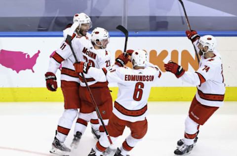 The Carolina Hurricanes celebrate a short-handed goal by Brock McGinn #23 a. (Photo by Elsa/Getty Images)