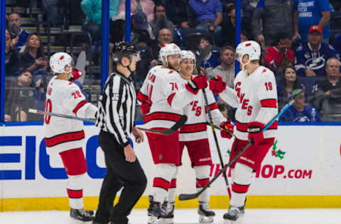 TAMPA, FL – NOVEMBER 30: The Carolina Hurricanes celebrate a goal against the Tampa Bay Lightning during the first period at Amalie Arena on November 30, 2019 in Tampa, Florida. (Photo by Scott Audette /NHLI via Getty Images)