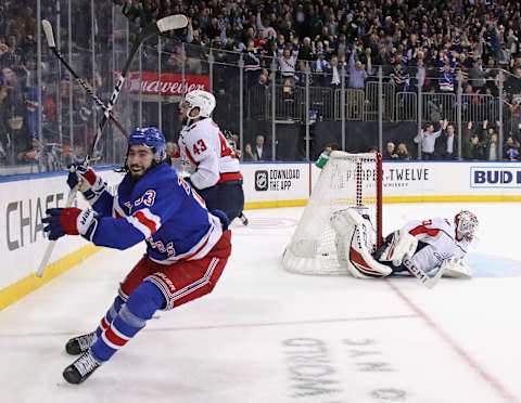 NEW YORK, NEW YORK – MARCH 05: Mika Zibanejad #93 of the New York Rangers scores his fifth goal of the game in overtime to defeat Ilya Samsonov #30 and the Washington Capitals 5-4 at Madison Square Garden on March 05, 2020 in New York City. (Photo by Bruce Bennett/Getty Images)