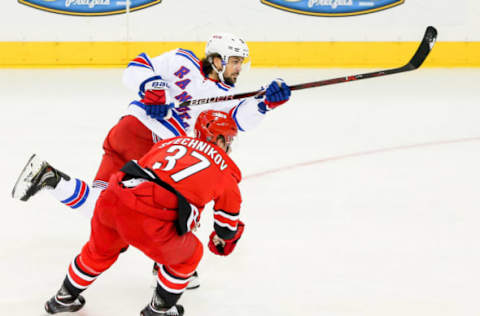 NEW YORK, NY – FEBRUARY 08: New York Rangers Right Wing Mats Zuccarello (36) takes a wrist shot during the first period of the National Hockey League game between the Carolina Hurricanes and the New York Rangers on February 8, 2019 at Madison Square Garden in New York, NY. (Photo by Joshua Sarner/Icon Sportswire via Getty Images)