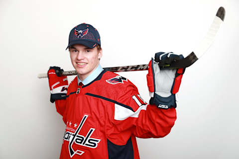 DALLAS, TX – JUNE 22: Alexander Alexeyev poses after being selected thirty-first overall by the Washington Capitals during the first round of the 2018 NHL Draft at American Airlines Center on June 22, 2018 in Dallas, Texas. (Photo by Tom Pennington/Getty Images)