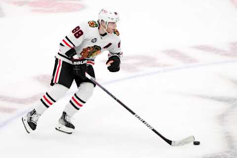 Apr 20, 2022; Glendale, Arizona, USA; Chicago Blackhawks right wing Patrick Kane (88) skates the puck against the Arizona Coyotes during the overtime session at Gila River Arena. Mandatory Credit: Joe Camporeale-USA TODAY Sports