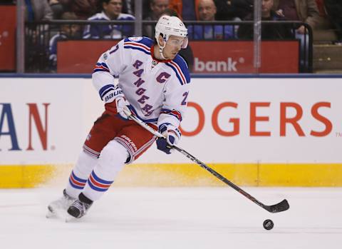 Jan 19, 2017; Toronto, Ontario, CAN; New York Rangers defenseman Ryan McDonagh (27) carries he puck against the Toronto Maple Leafs at Air Canada Centre. New York defeated Toronto 5-3. Mandatory Credit: John E. Sokolowski-USA TODAY Sports