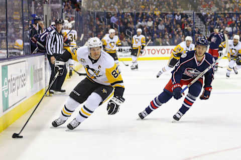 Feb 17, 2017; Columbus, OH, USA; Pittsburgh Penguins center Sidney Crosby (87) skates against Columbus Blue Jackets center Alexander Wennberg (10) at Nationwide Arena. The Blue Jackets won 2-1 in overtime. Mandatory Credit: Aaron Doster-USA TODAY Sports