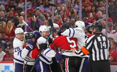 CHICAGO, ILLINOIS – OCTOBER 27: An altercation breaks out between the Chicago Blackhawks and the Toronto Maple Leafsin the second period at the United Center on October 27, 2021 in Chicago, Illinois. (Photo by Jonathan Daniel/Getty Images)