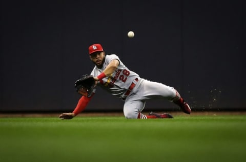 MILWAUKEE, WI – APRIL 04: Tommy Pham #28 of the St. Louis Cardinals dives attempting to catch a fly ball in the ninth inning against the Milwaukee Brewers at Miller Park on April 4, 2018 in Milwaukee, Wisconsin. (Dylan Buell/Getty Images) *** Local Caption *** Tommy Pham